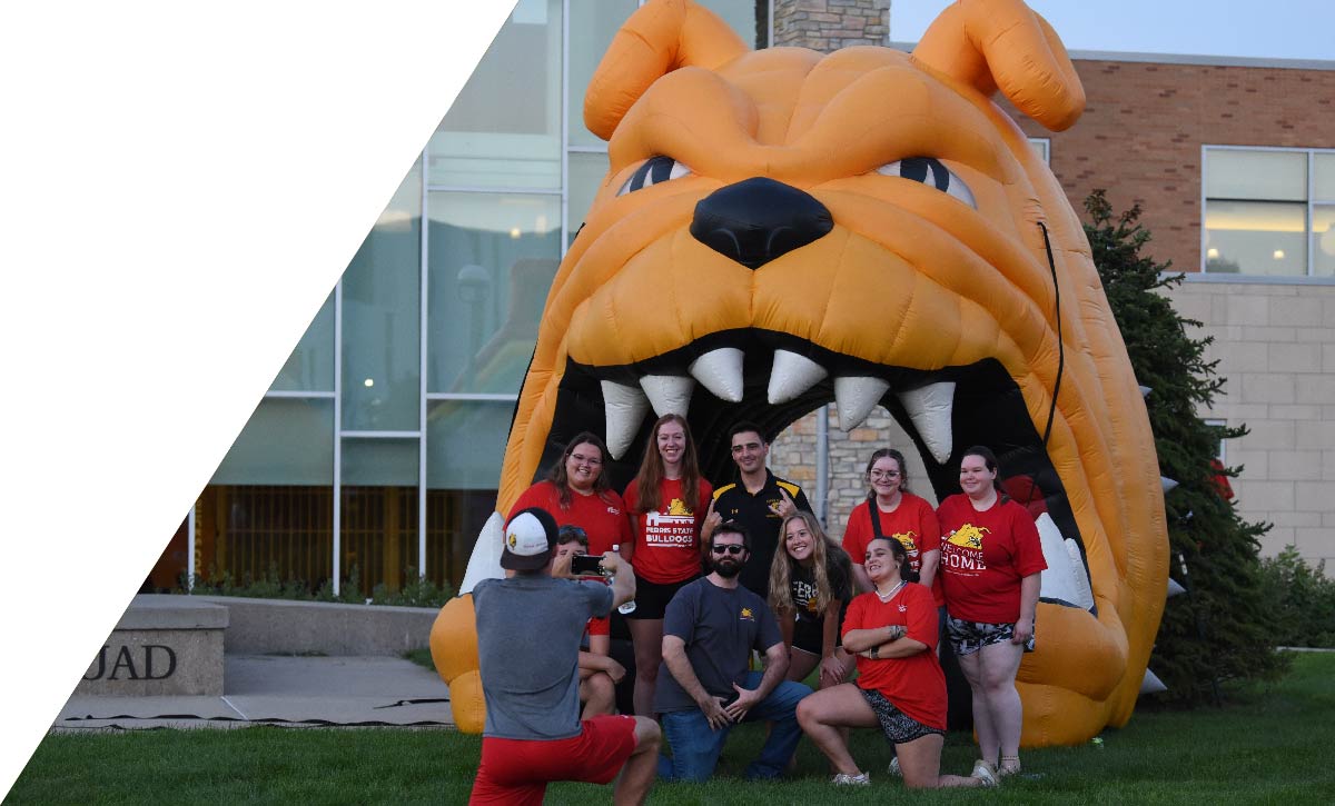 Students in front of blow up Bulldog