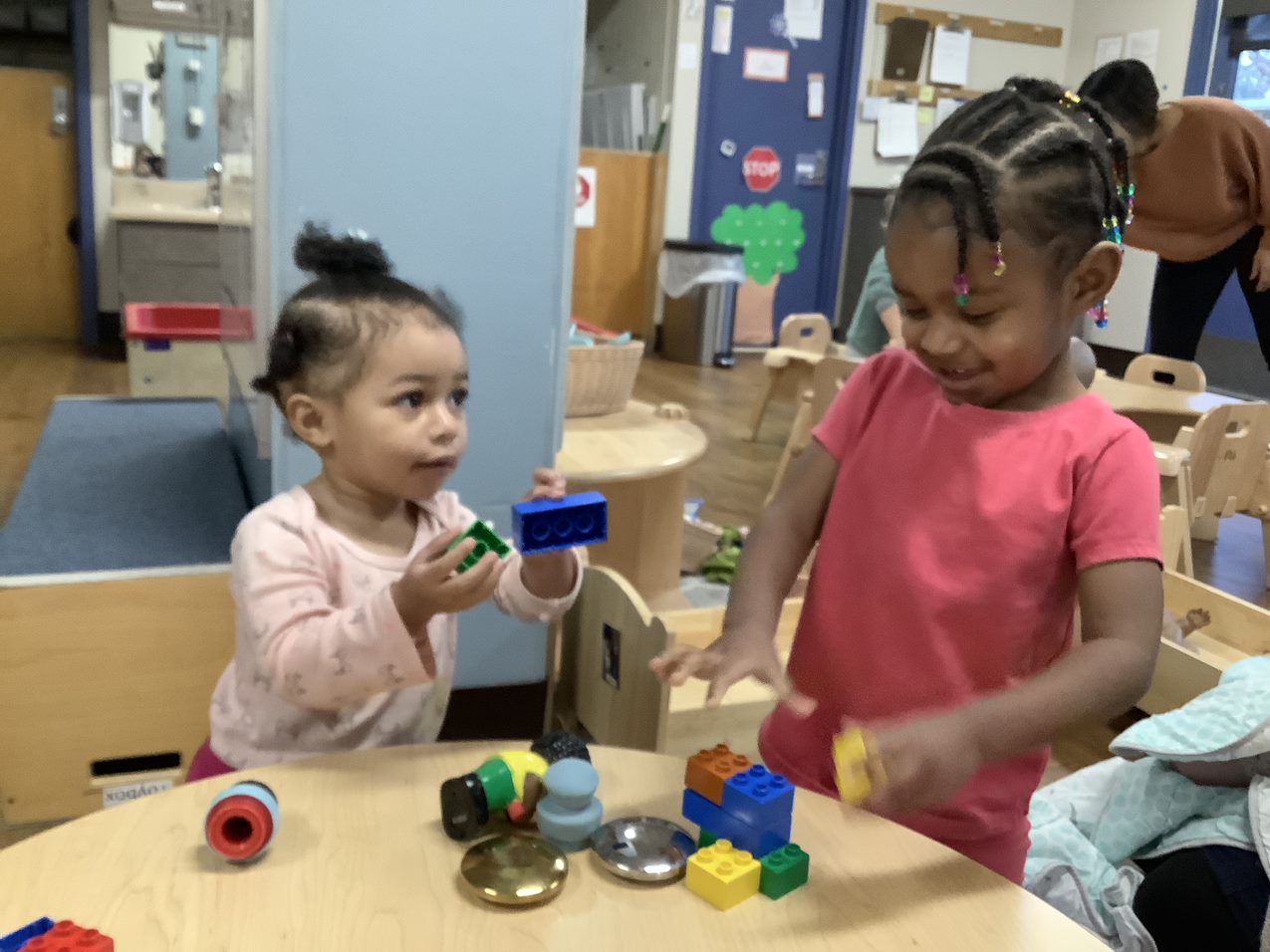 Toddlers playing with blocks