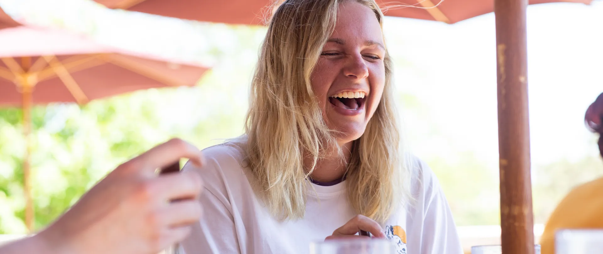 girl laughing in the sun