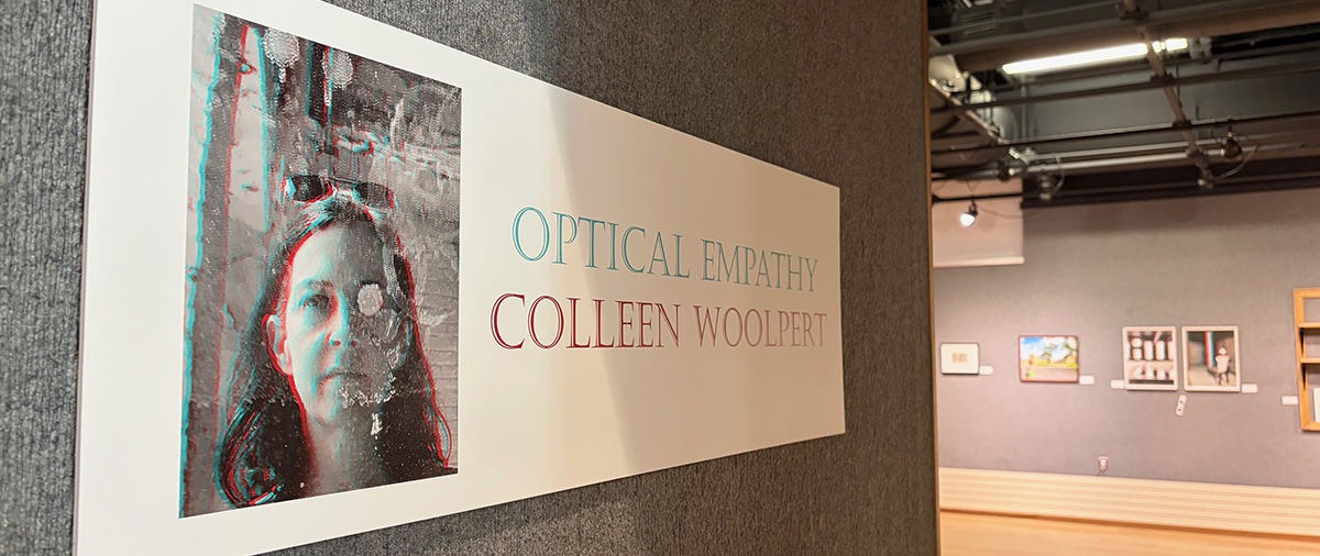 close up of sign for art gallery exhibit that says optical empathy