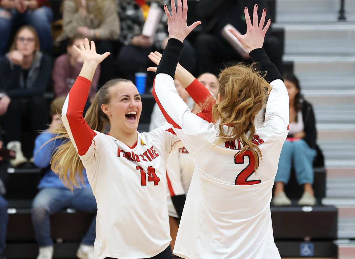 Ferris State volleyball players celebrating