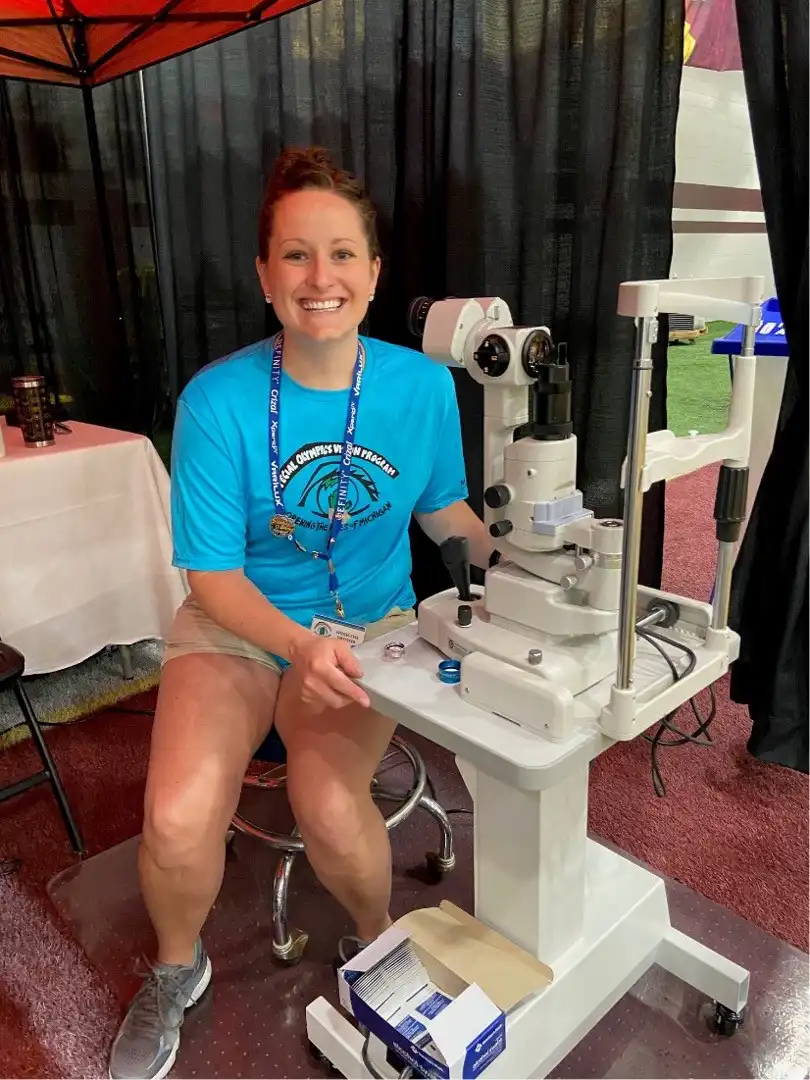 Dr. Andrea Lirones with eye exam equipment