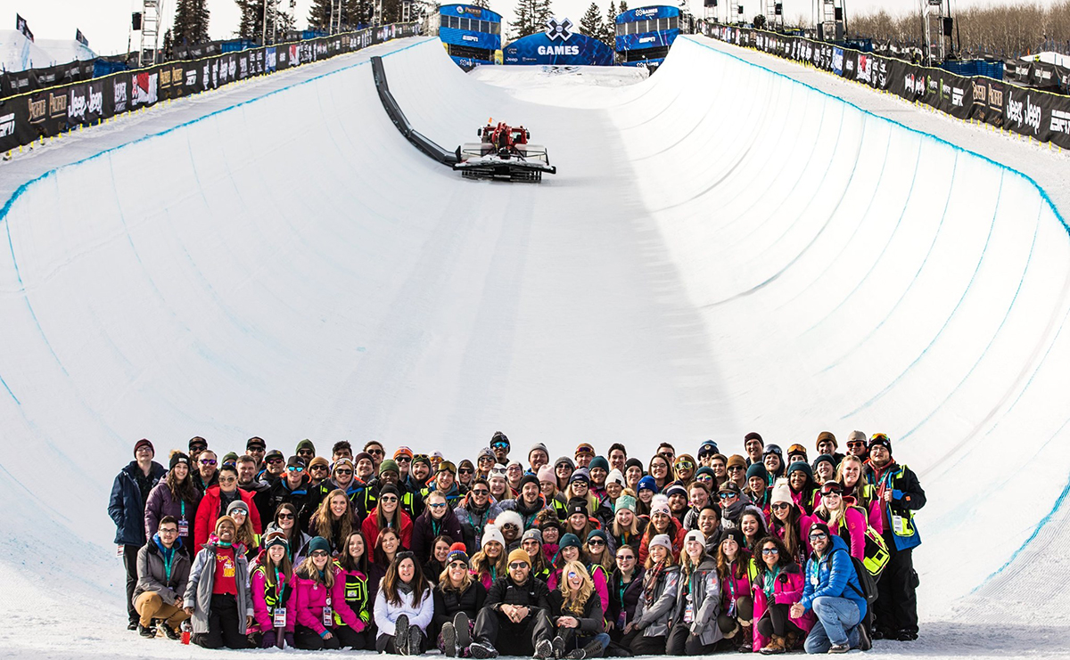 Students posing for a photo in the half-pipe at the X Games