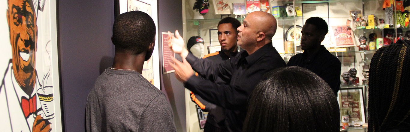 Visitors on a tour of the Jim Crow Museum