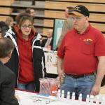 Picture of participant asking questions about a retirement program.