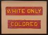 "White Only" and "Colored" signs.