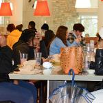 Students laughing while enjoying food