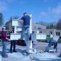 Welding & Construction Students with Grounds Crew Erect SSTS