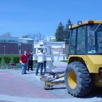 Welding & Construction Students with Grounds Crew Erect SSTS