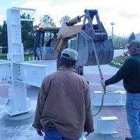 Welding & Construction Students with Grounds Crew Erect SSTS