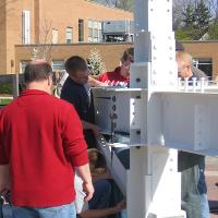 Welding & Construction Students with Grounds Crew Erect SSTS