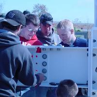 ding & Construction Students with Grounds Crew Erect SSTS