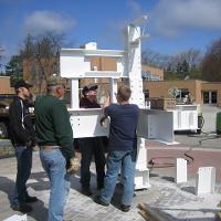 Welding & Construction Students with Grounds Crew Erect SSTS