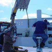 Welding & Construction Students with Grounds Crew Erect SSTS