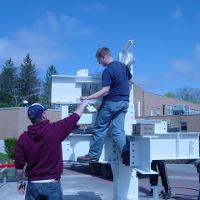 Welding & Construction Students with Grounds Crew Erect SSTS