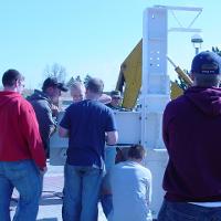 Welding & Construction Students with Grounds Crew Erect SSTS