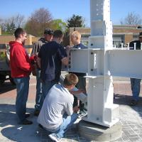 Welding & Construction Students with Grounds Crew Erect SSTS