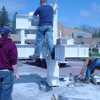 Welding & Construction Students with Grounds Crew Erect SSTS