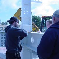 Welding & Construction Students with Grounds Crew Erect SSTS