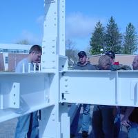 Welding & Construction Students with Grounds Crew Erect SSTS