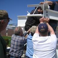 Welding & Construction Students with Grounds Crew Erect SSTS