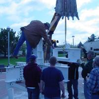 Welding & Construction Students with Grounds Crew Erect SSTS