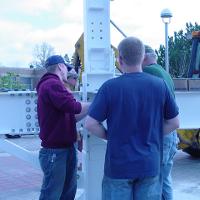 Welding & Construction Students with Grounds Crew Erect SSTS