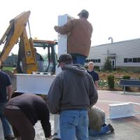 Welding & Construction Students with Grounds Crew Erect SSTS