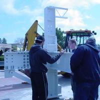 Welding & Construction Students with Grounds Crew Erect SSTS