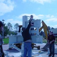 Welding & Construction Students with Grounds Crew Erect SSTS