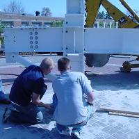 Welding & Construction Students with Grounds Crew Erect SSTS