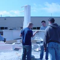 Welding & Construction Students with Grounds Crew Erect SSTS