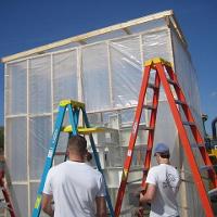 Construction Students Erect On-Site Paint Enclosure