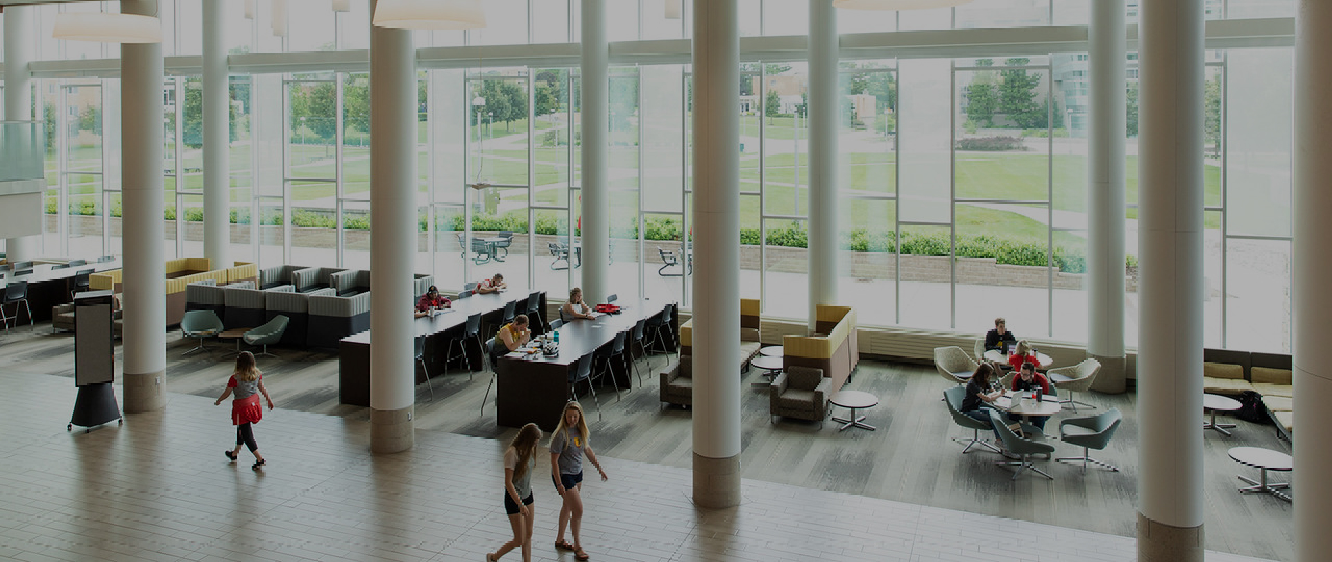 Students walking through the David L. Eisler Center