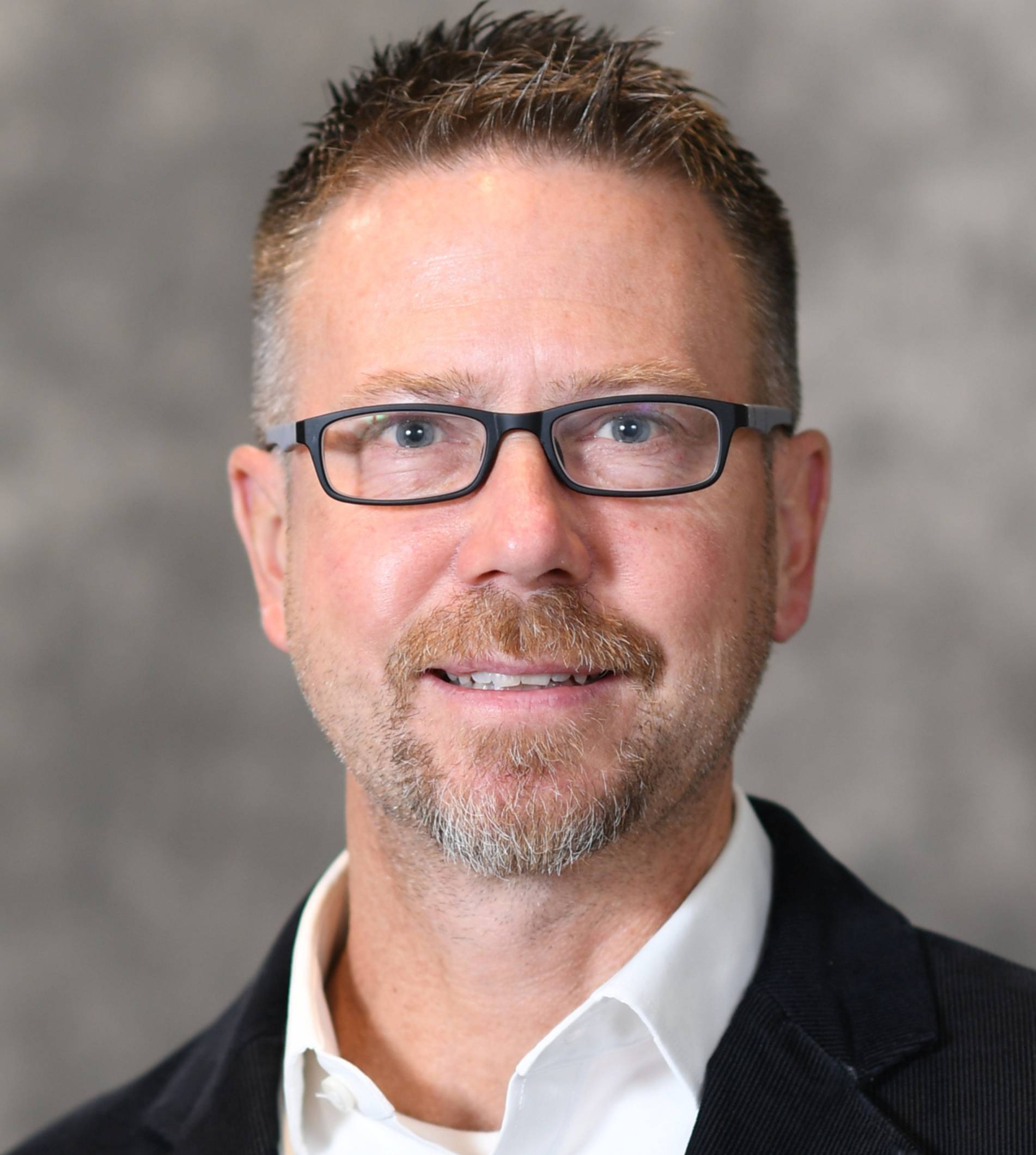 Headshot of Chris Loiselle, Charter Schools Office Director