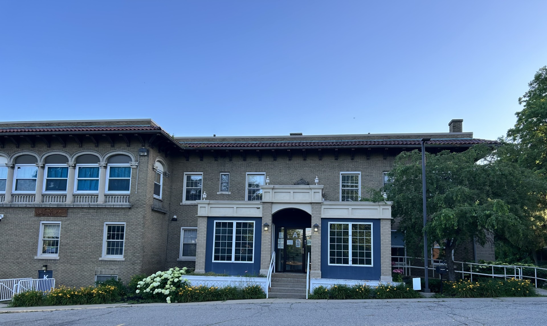 Photo of William C. Abney Academy's front entrace. 
