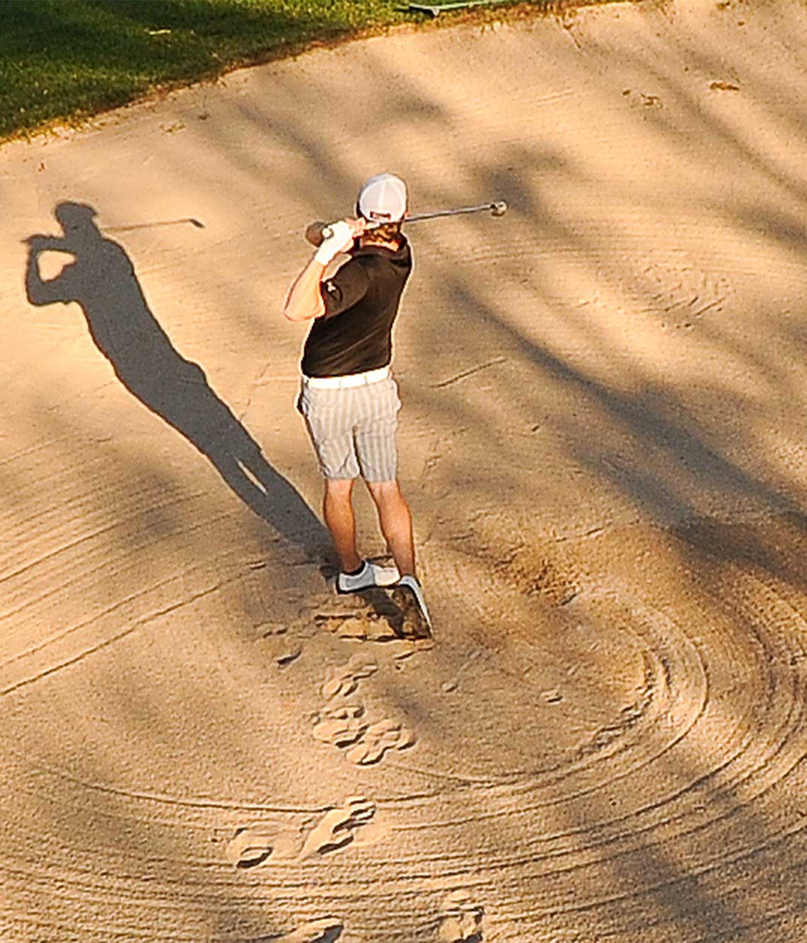 Golfer in bunker