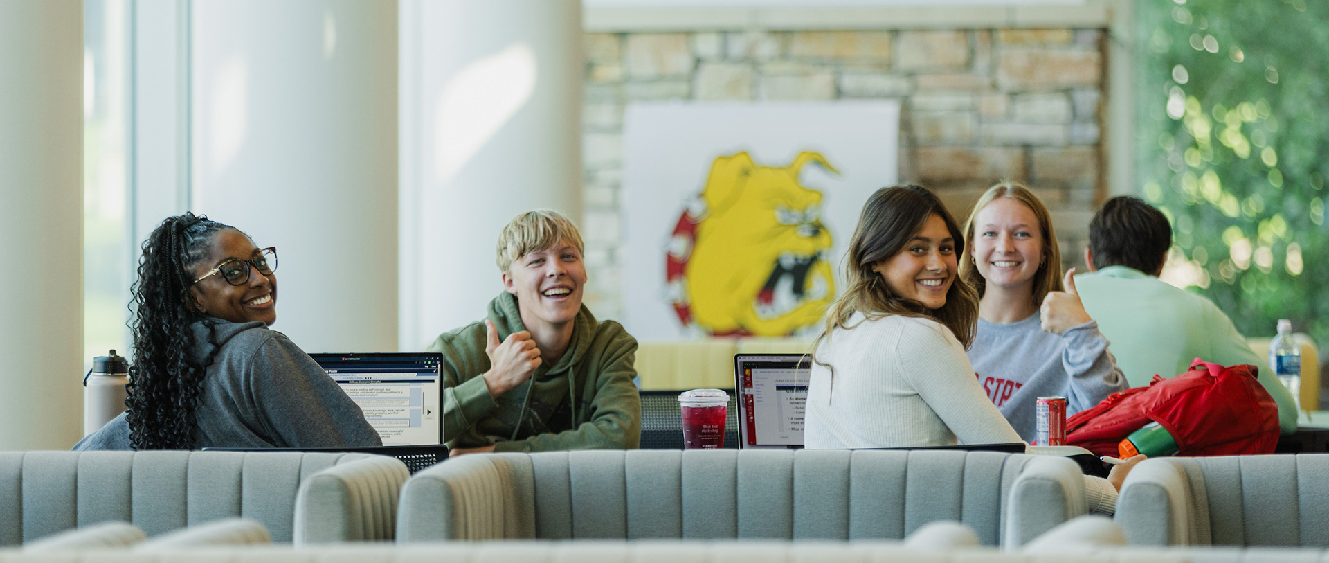 Image of Ferris State University's David L. Eisler Center with student activity