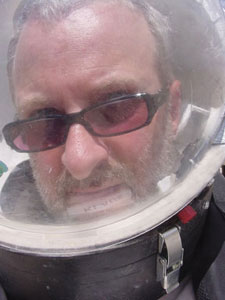 Kurt Klaus wearing a space helmet