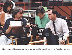 Director John Gartner discusses a scene with lead actor Josh Lucas