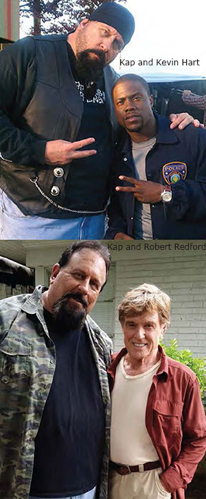 John Kap posing with Kevin Hart and Robert Redford