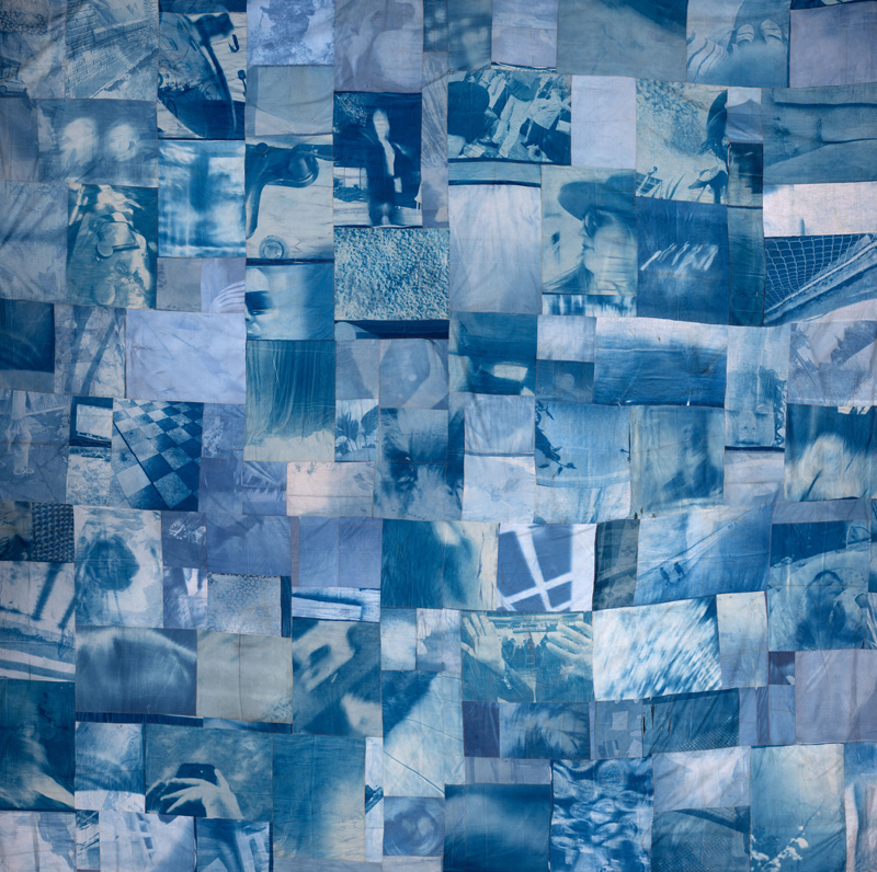 A collage of blue-tinted abstract photographs made to look like a quilt