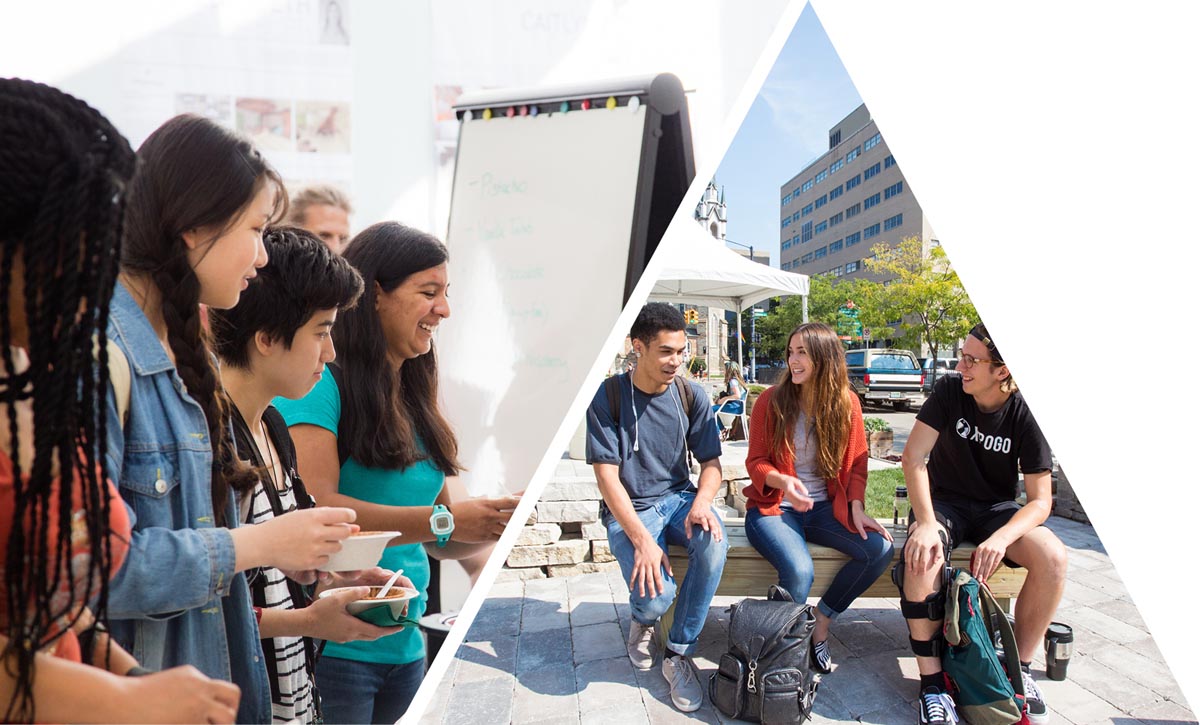 Students mingling in an outside campus area. 
