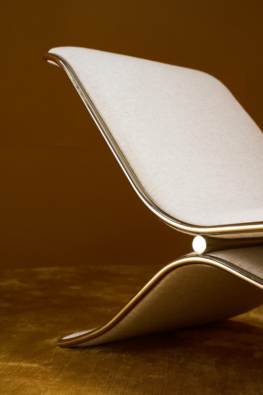 A chaise lounge made of metal and leather