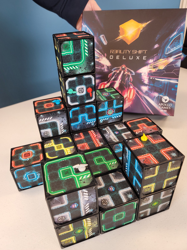 a board game with all the pieces laid out in front of the box