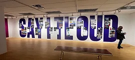 Say It Loud letters displayed inside a gallery
