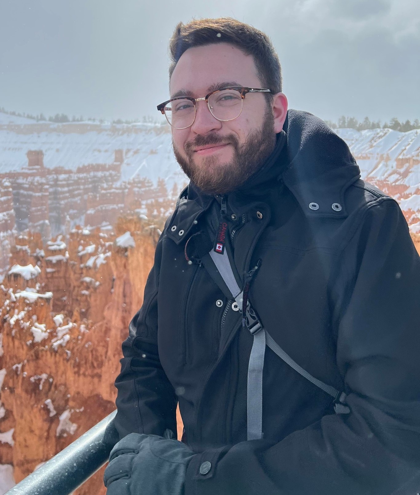 Josh Brady in front of mountains