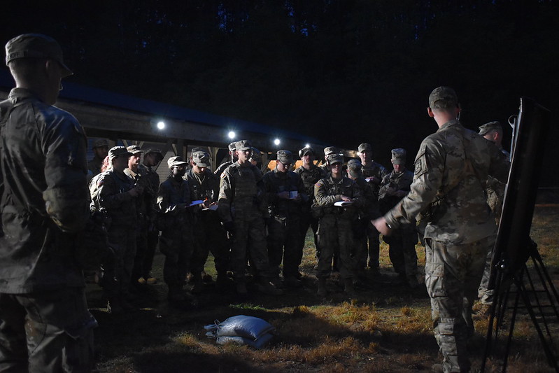 Night FTX Brief Cadets gather for a briefing by the Rogers Heights Range