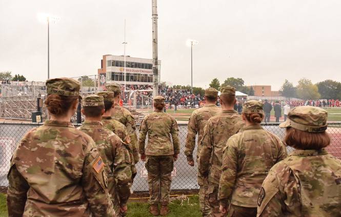 Cadets prepare for the beginning of the national anthem