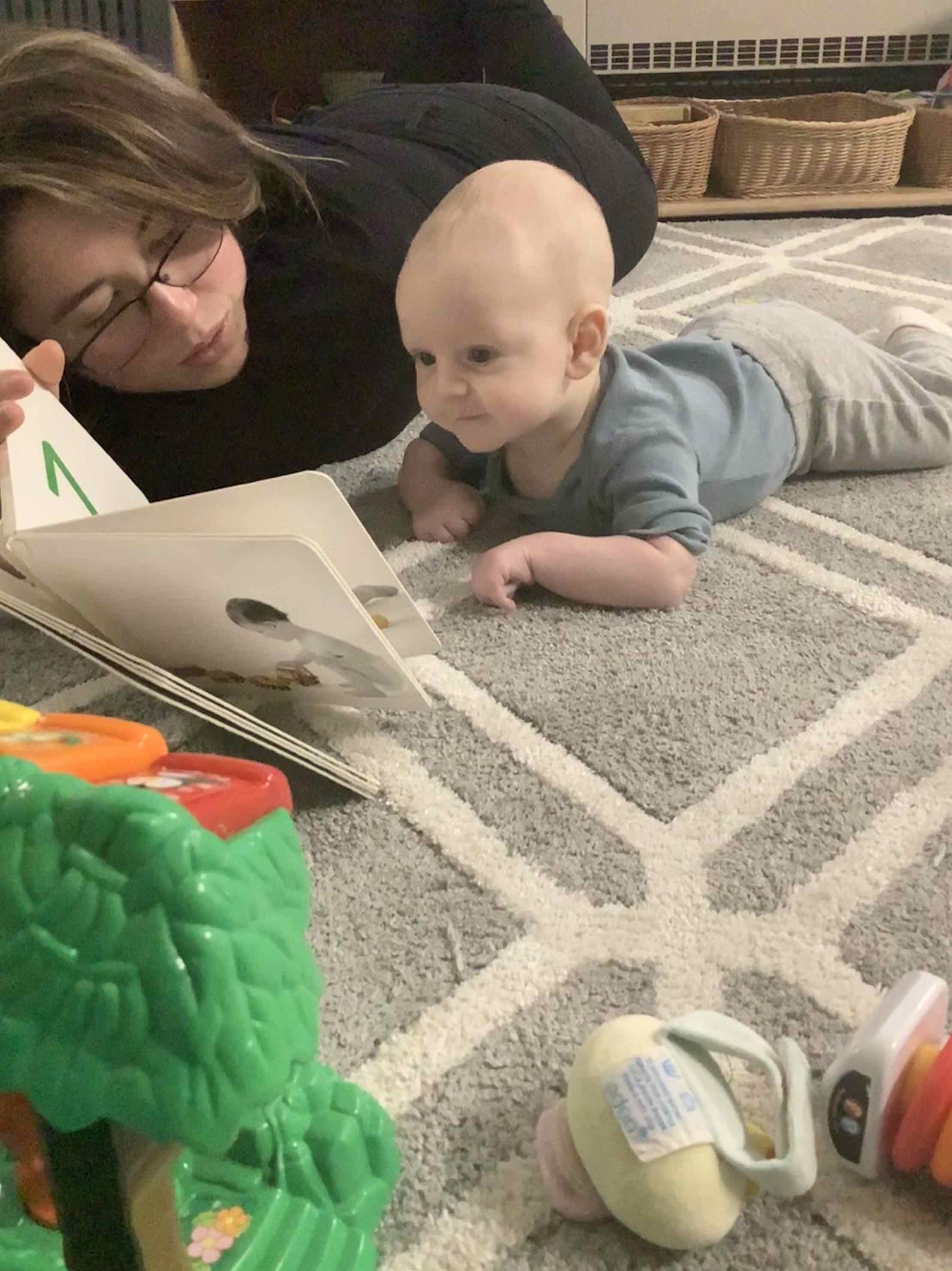 baby reading with lauren